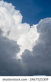 Blue sky and white clouds. Texture background pattern. Cumulonimbus clouds with blue sky. Giant cumulonimbus thunder storm cloud building in Cloudy sky Tropical Sky Rainy Season azure navy admiral