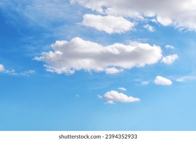 Blue sky with white fluffy cloud. Cumulus clouds background. Cloudscape morning sky. The concepts of freedom of live, never give up and positive though energy. - Powered by Shutterstock