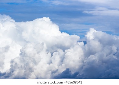 Blue Sky With A Lot Of White Puffy Clouds.