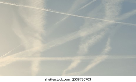 blue sky, white stripes, traces of airplane flight, air background abstract . High quality photo