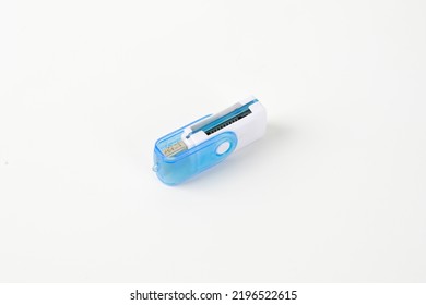 Blue Small Memory Card Reader To Transfer File From Memory Card To Computer On White Background