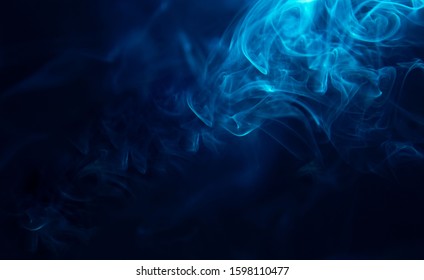  blue smoke ambient in night  with black background.mysterious smoke for wallpaper in black or night background forming shapes - Powered by Shutterstock
