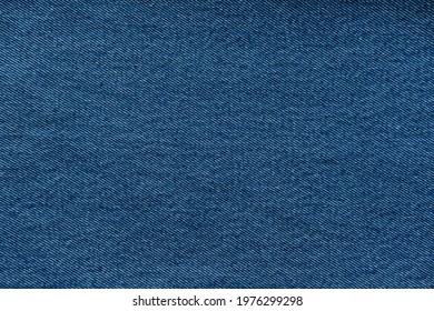 Blue smooth denim texture background.
