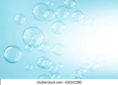 Blue soap bubbles background