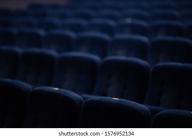 Blue soft velvet chairs in the theater hall