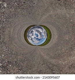 Blue Sphere Little Planet Inside Gravel Road Background. 