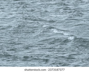 Blue splashy and small waves 