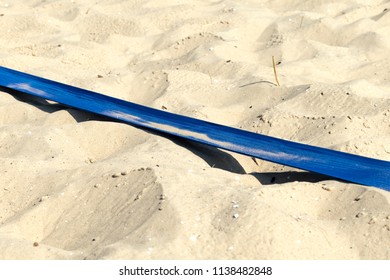 Blue Sport Riboon To Mark Field On The Beach.