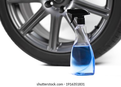 Blue Spray For Cleaning The Wheels. Close Up. Isolated On A White Background.