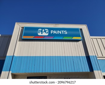 Blue Springs Missouri USA - December 16 2021: Sign Above Building Entrance For PPG PAINTS Retail Store Beneath Blue Sky