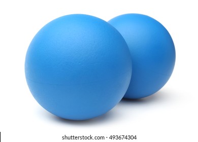 Blue squash balls on white background