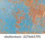 The blue steel plate had been hit and damaged. It is a reddish-brown rust that deteriorates iron. See the clear texture, use it as a background for recycled goods or an antique shop. transformed metal