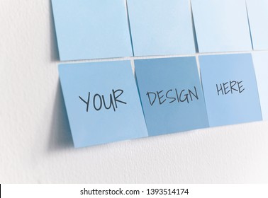 Blue sticky note mockups on a white wall
