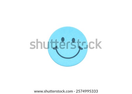 Blue sticky note with smiley isolated on white background