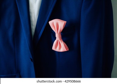  Blue Suit And Pink Bow Tie