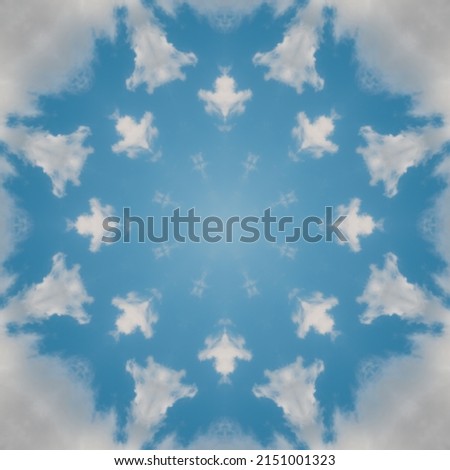 Blue summer sky with clouds, mandala background, abstract kaleidoscope