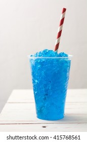 Blue Summer Slushie On White Wooden Table
