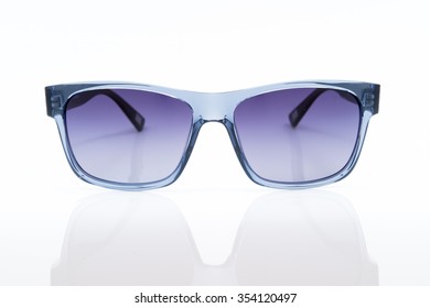 Blue Sunglasses On A White Background