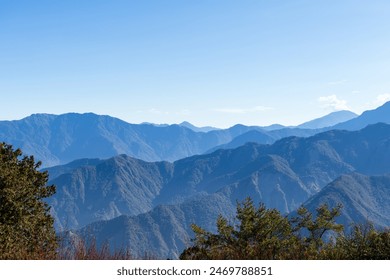 Blue sunny day with mountain landscape in Taiwan - Powered by Shutterstock