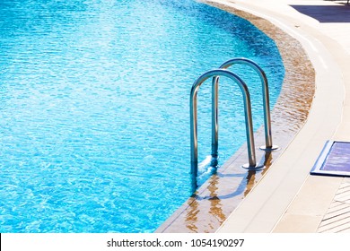 Blue Swimming Pool With Stair At Luxery Hotel