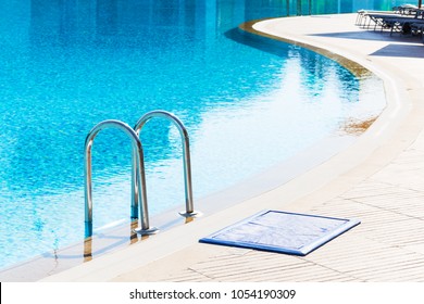 Blue Swimming Pool With Stair At Luxery Hotel