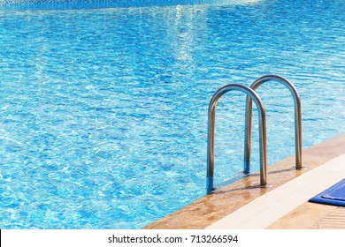 Blue Swimming Pool With Stair At Luxery Hotel