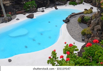 Blue swimming pool in tropical garden - Powered by Shutterstock