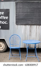 Blue Table And Chair Set Outside Pop Up Food Truck Caravan