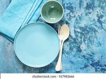 Blue Table Setting - Plates, Cutlery And Bowl