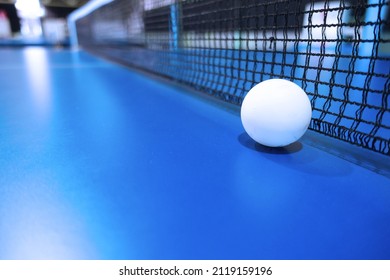 Blue table tennis table on which the ball is placed       