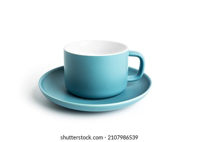 Blue tea cup and saucer for drink isolated on white background. Ceramic coffee cup or mug close up. High quality photo