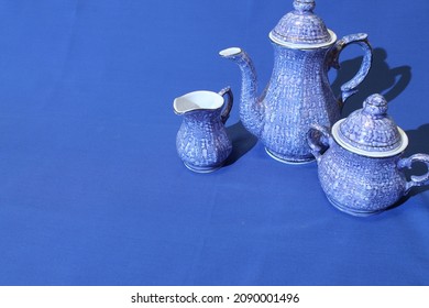 Blue Tea Set On A Blue Background