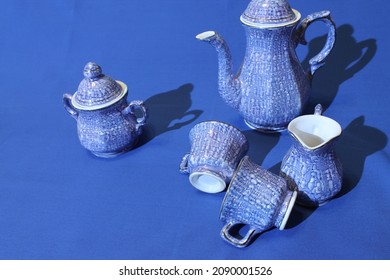 Blue Tea Set On A Blue Background