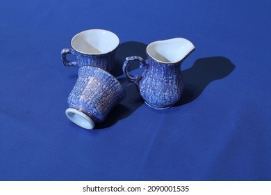 Blue Tea Set On A Blue Background