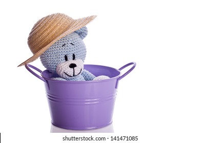 Blue Teddy Bear With Hat In A Purple Bathtub Bucket