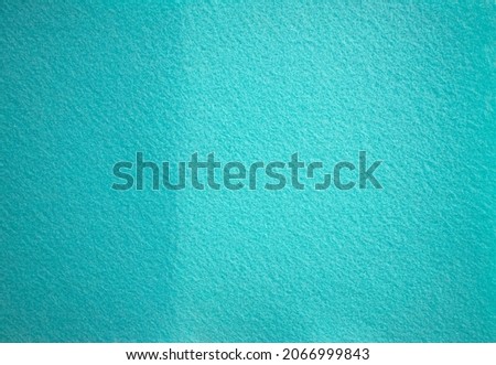 Blue texture of soft cardboard. Clear blue background. A clean place for a congratulatory text.