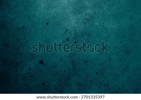 Blue textured surface with aged paint and subtle dark spots