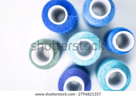 Blue thread spools in circular arrangement, sewing, threads, cra