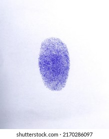 Blue Thumb Impression On White Paper