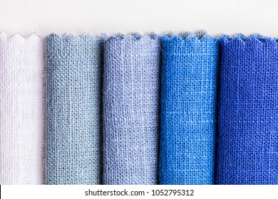 blue tone colored linen fabric for background.