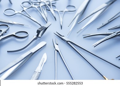 Blue tone image of assorted surgical instruments