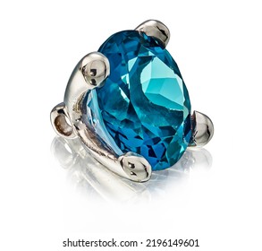 Blue Topaz Gem Stone In Golden Setting Isolated.