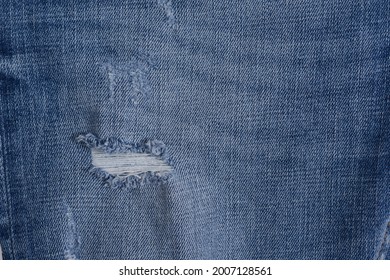 Blue Torn Jeans Texture. Denim Jeans Texture,background
