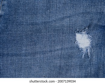 Blue Torn Jeans Texture. Denim Jeans Texture,background