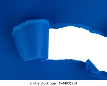 Blue torn sheet of paper with whole space for text