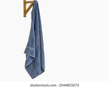 blue towel: on a towel hook a against on white background - Powered by Shutterstock