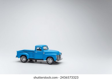 blue toy car pickup on white background - Powered by Shutterstock