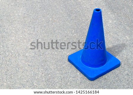 blue traffic cone under construction web site sign