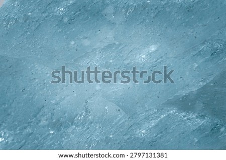 Blue Transparent Ice Texture Background With Natural Frozen Crystal Pattern Closeup