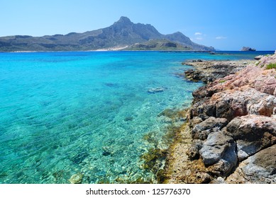 Blue Transparent Sea and Mountains
